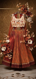 Orange Lehriya lehanga and white choli with embroidery and dupatta