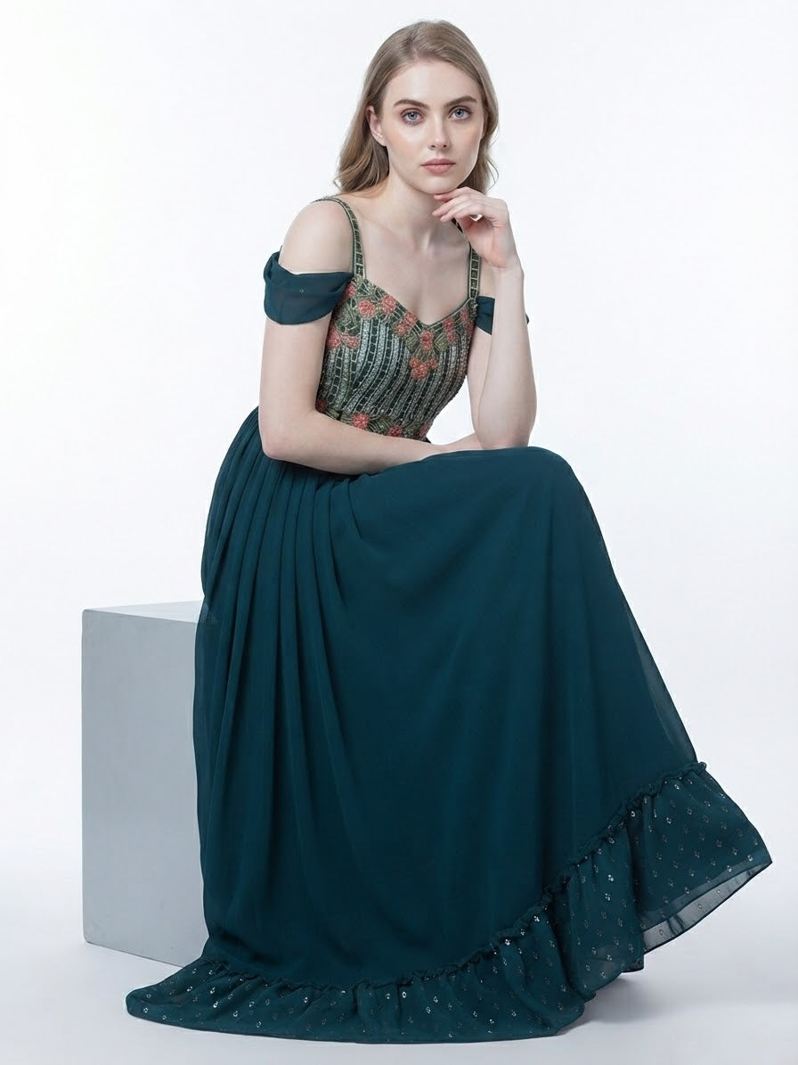 Teal green gown with royal look partywear