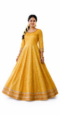 Radiant Yellow Embroidered Flared Anarkali Gown (Festive / Traditional Wear)  Color: Bright Mustard Yellow / Golden Yellow featuring intricate tonal zari weave